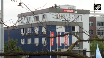 ANI News - Thousands protested outside Belgrade HQ of media outlet sympathetic to Serbia's gov...png
