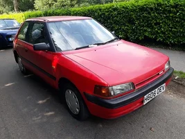 Mazda-323-13-carb-1991-H-reg-retro.webp
