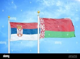 serbia-and-belarus-two-flags-on-flagpoles-and-blue-sky-2DXHC8E.jpg
